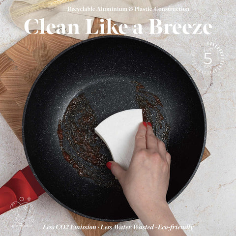 Product image of Wok 28cm. Part of the Metallic Line Burgundy Edition . Features: • Material: forged aluminum • Wok Ø28*7,4 cm 3,2L • Color: metallic burgundy REGISTERED DESIGN BY BERLINGER HAUS!. (Studio view). Official Berlinger Haus product, boosted by Promintra sl.