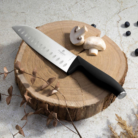 Product image of 4pcs knife set. Part of the Black Vantage Collection/Matte Black Collection/Black Silver Collection . Features: • Material: stainless steel • Chef knife 20 cm • Santoku knife 17,5 cm • Utility knife 12,5 cm • Paring knife 9 cm • Color: black- silver REGISTERE.... (Studio view). Official Berlinger Haus product, boosted by Promintra sl.