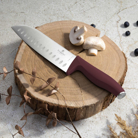 Product image of 4pcs knife set. Part of the Leonardo Collection . Features: • Material: stainless steel • Chef knife 20 cm • Santoku knife 17,5 cm • Utility knife 12,5 cm • Paring knife 9 cm • Color: matt bordeaux REGISTERE.... (Studio view). Official Berlinger Haus product, boosted by Promintra sl.