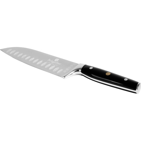 Product image of Santoku knife 17,5cm. Part of the Black Vantage Collection/Matte Black Collection/Black Silver Collection . Features: • Material: stainless steel • Size: 17,5 cm • Color: black- silver. (Studio view). Official Berlinger Haus product, boosted by Promintra sl.