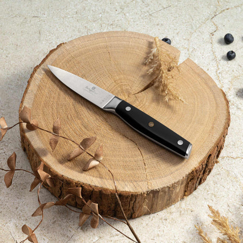 Product image of Paring knife 9cm. Part of the Black Vantage Collection/Matte Black Collection/Black Silver Collection . Features: • Material: stainless steel • Size: 9 cm • Color: black- silver. (Studio view). Official Berlinger Haus product, boosted by Promintra sl.