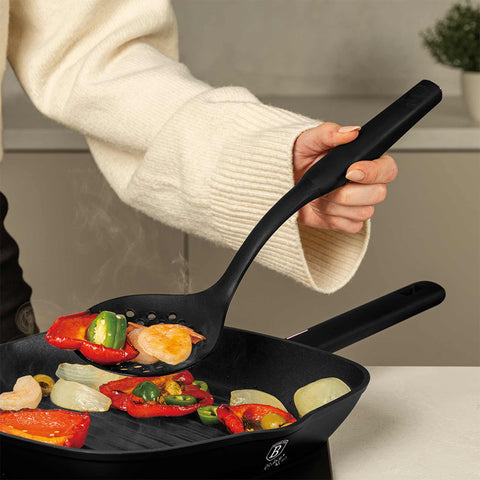 Product image of 12pcs knife and kitchen tool set with BAMBOO cutting board and stand. Part of the Black Rose Collection . Features: • Material: stainless steel, nylon, plastic • Chef knife 20 cm • Bread knife 20 cm • Santoku knife 17,5 cm • Utility knife 12,5 cm • Paring knife 9.... (Studio view). Official Berlinger Haus product, boosted by Promintra sl.