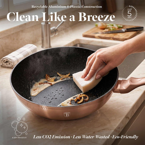 Product image of Wok 30cm. Part of the Metallic Line Rose Gold Edition . Features: • Material: forged aluminum • Wok Ø30*8,8 cm 4,8L • Color: metallic rose gold REGISTERED DESIGN BY BERLINGER HAUS!. (Studio view). Official Berlinger Haus product, boosted by Promintra sl.