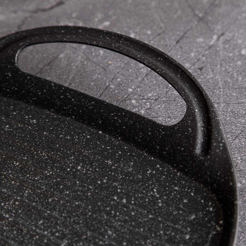 Product image of Grill plate 47cm. Part of the Granit Diamond Line . Features: • Material: aluminum • Size: 47*29 cm • Color: black/ orange • FREE 2 PCS HEAT RESISTANT SILICONE HANDLE. (Studio view). Official Berlinger Haus product, boosted by Promintra sl.
