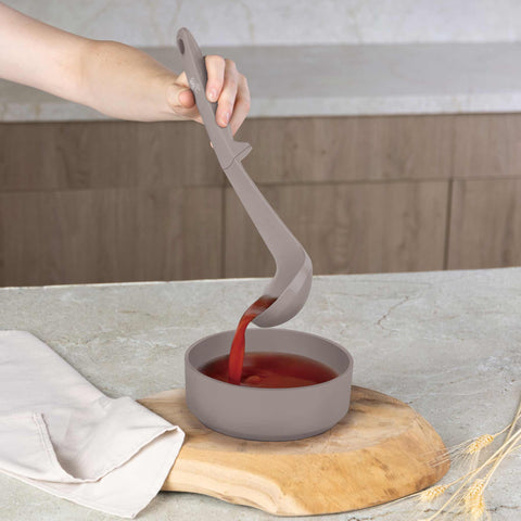 Product image of 5pcs kitchen tool set. Part of the Taupe Collection . Features: • Material: nylon, plastic • Include: • Soup ladle 1 pc • Cooking spoon 1 pc • Spaghetti ladle 1 pc • Skimmer 1 pc • Food clamp (nylon) • Color: taupe. (Studio view). Official Berlinger Haus product, boosted by Promintra sl.