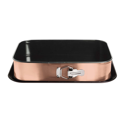 Product image of Rectangle springform 39x27cm. Part of the Metallic Line Rose Gold Edition . Features: • Material: carbon steel with titan non-stick coating • Size: 35*23*6,5 cm • Base size: 39*27 cm • Color: metallic rose gold. (Studio view). Official Berlinger Haus product, boosted by Promintra sl.