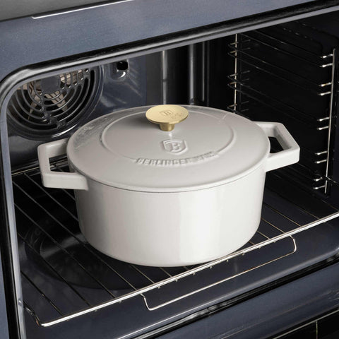 Product image of Casserole 24cm cast iron. Part of the Sahara Collection . Features: • Material: cast iron with 3 layers shiny ENAMEL coating • Size: Ø24*11 cm 4,35 L • Color: cream. (Studio view). Official Berlinger Haus product, boosted by Promintra sl.