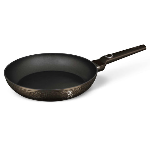 Product image of Frypan 28cm. Part of the Primal Gloss Collection . Features: • Material: forged aluminum • Frypan Ø28*5,2 cm 2,4L • Color: dark grey with black shadow and shining hammer effect REGISTERED DESIGN BY BERLINGER .... (Studio view). Official Berlinger Haus product, boosted by Promintra sl.