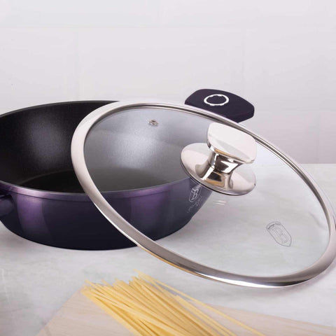 Product image of Shallow pot with lid 24cm. Part of the Purple Eclipse Collection . Features: • Material: forged aluminum • Shallow pot with lid Ø24*6,5 cm 2,3L • Color: metallic purple with black shadow shadow REGISTERED DESIGN BY BERLINGER.... (Studio view). Official Berlinger Haus product, boosted by Promintra sl.