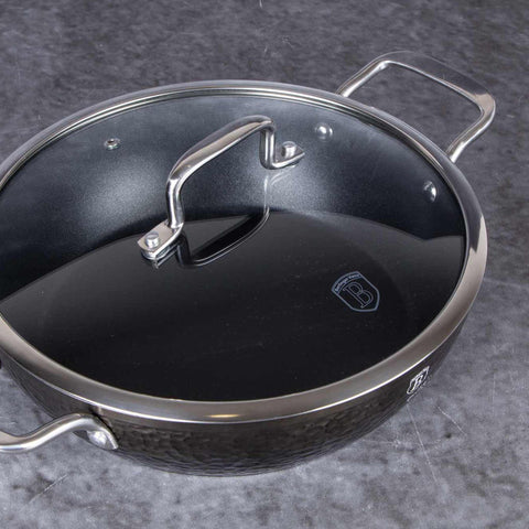 Product image of Shallow pot with lid 28cm. Part of the Shine Basalt Collection . Features: • Material: forged aluminum • Shallow pot with lid Ø28*7,5 cm 3,8L • Color: black with shining hammer effect REGISTERED DESIGN BY BERLINGER HAUS!. (Studio view). Official Berlinger Haus product, boosted by Promintra sl.