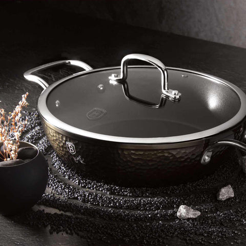 Product image of Shallow pot with lid 28cm. Part of the Shine Basalt Collection . Features: • Material: forged aluminum • Shallow pot with lid Ø28*7,5 cm 3,8L • Color: black with shining hammer effect REGISTERED DESIGN BY BERLINGER HAUS!. (Studio view). Official Berlinger Haus product, boosted by Promintra sl.