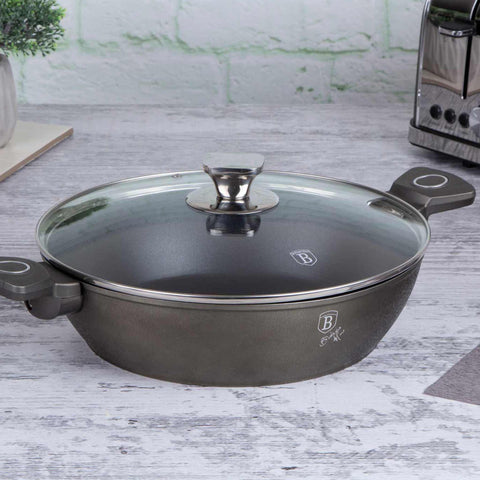 Product image of Shallow pot with lid 28cm. Part of the Crystal Collection . Features: • Material: forged aluminum with non-stick coating • Shallow pot with lid Ø28*7,5 cm 3,8L • Color: dark champagne REGISTERED DESIGN BY BERLINGER HAUS!. (Studio view). Official Berlinger Haus product, boosted by Promintra sl.