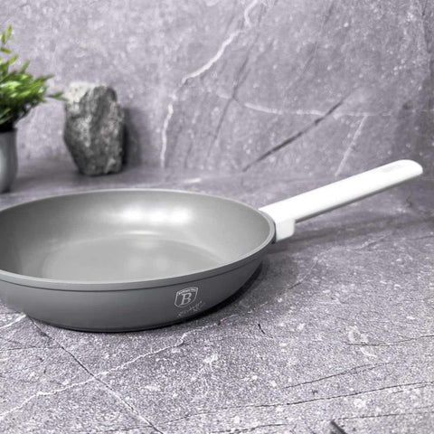 Product image of Frypan 28cm. Part of the Aspen Collection . Features: • Material: forged aluminum with grey titan non-stick coating • Frypan Ø28*5,2 cm 2,4L • Color: matt grey REGISTERED DESIGN BY BERLINGER HAUS!. (Studio view). Official Berlinger Haus product, boosted by Promintra sl.
