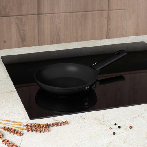 Product image of Frypan 20cm. Part of the Monaco Collection . Features: • Material: forged aluminum with black titan non-stick coating • Frypan Ø20*4,5 cm 1,0L • Color: black- rose gold REGISTERED DESIGN BY BERLINGER HAUS!. (Studio view). Official Berlinger Haus product, boosted by Promintra sl.