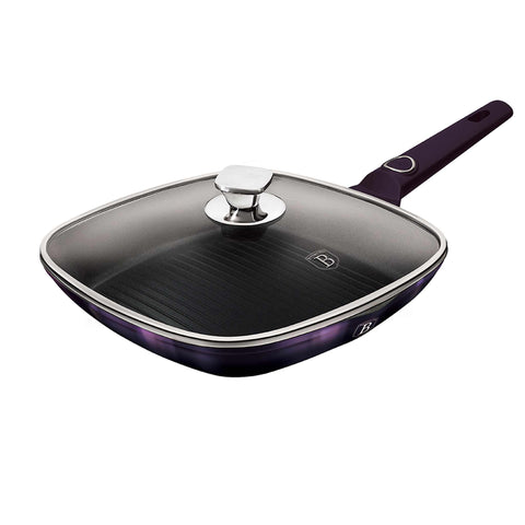 Product image of Grill pan with lid 28cm. Part of the Purple Eclipse Collection . Features: • Material: forged aluminum • Grill pan Ø28*4,1 cm 2,1L • Color: metallic purple with black shadow shadow REGISTERED DESIGN BY BERLINGER HAUS!. (Studio view). Official Berlinger Haus product, boosted by Promintra sl.