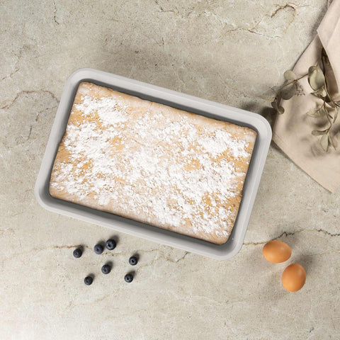 Product image of Oblong roaster 40x28cm. Part of the Sahara Collection . Features: • Material: carbon steel with non-stick titanPro coating • Size: 40*28*7 cm • Color: matt cream. (Studio view). Official Berlinger Haus product, boosted by Promintra sl.