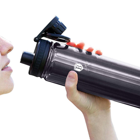 Product image of Sport bottle 540ml. Part of the Metallic Line Carbon Pro Edition . Features: • Material: inner body 18/10 stainless steel • Capacity: 540 ml • Color: metallic dark grey • Packing: half giftbox. (Studio view). Official Berlinger Haus product, boosted by Promintra sl.