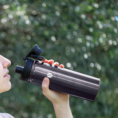 Product image of Sport bottle 540ml. Part of the Metallic Line Carbon Pro Edition . Features: • Material: inner body 18/10 stainless steel • Capacity: 540 ml • Color: metallic dark grey • Packing: half giftbox. (Studio view). Official Berlinger Haus product, boosted by Promintra sl.