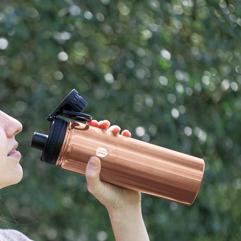 Product image of Sport bottle 540ml. Part of the Metallic Line Rose Gold Edition . Features: • Material: inner body 18/10 stainless steel • Capacity: 540 ml • Color: metallic rose gold • Packing: half giftbox. (Studio view). Official Berlinger Haus product, boosted by Promintra sl.