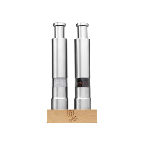 Product image of 2pcs salt and pepper mill set with bamboo stand. Part of the Black Vantage Collection/Matte Black Collection/Black Silver Collection/Eternal Collection . Features: • Material: 18/10 stainless steel with bamboo stand • Color: stainless steel. (Conceptual view). Official Berlinger Haus product, boosted by Promintra sl.
