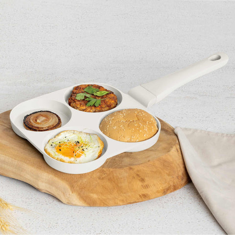 Product image of 4holes blank hamburger pan 20cm. Part of the Sahara Collection . Features: • Material: cast aluminium • Pancake pan Ø20*2,2 cm • Color: matt cream. (Studio view). Official Berlinger Haus product, boosted by Promintra sl.