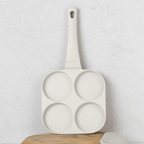 Product image of 4holes blank hamburger pan 20cm. Part of the Sahara Collection . Features: • Material: cast aluminium • Pancake pan Ø20*2,2 cm • Color: matt cream. (Studio view). Official Berlinger Haus product, boosted by Promintra sl.