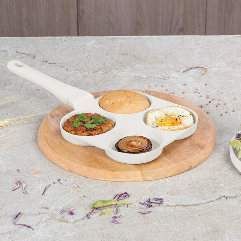 Product image of 4holes blank hamburger pan 20cm. Part of the Sahara Collection . Features: • Material: cast aluminium • Pancake pan Ø20*2,2 cm • Color: matt cream. (Studio view). Official Berlinger Haus product, boosted by Promintra sl.