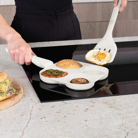 Product image of 4holes blank hamburger pan 20cm. Part of the Sahara Collection . Features: • Material: cast aluminium • Pancake pan Ø20*2,2 cm • Color: matt cream. (Studio view). Official Berlinger Haus product, boosted by Promintra sl.