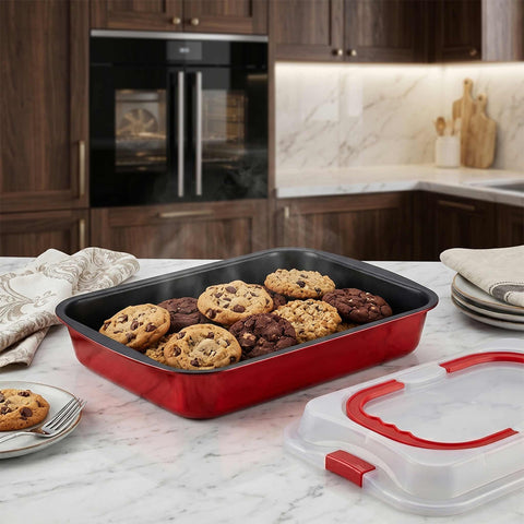 Product image of Oblong roaster with lid. Part of the Metallic Line Burgundy Edition . Features: • Material: carbon steel with titan non-stick coating, plastic cover • Size: 36*24,5*5,5 cm • Color: metallic burgundy. (Studio view). Official Berlinger Haus product, boosted by Promintra sl.