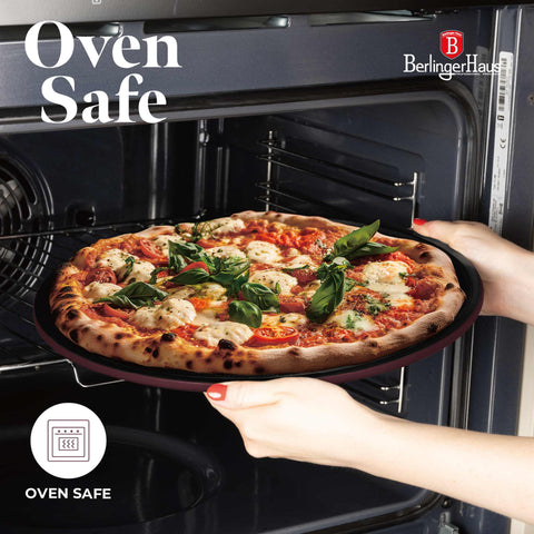 Product image of Pizza pan 32cm. Part of the Leonardo Collection . Features: • Material: carbon steel with titanPro non-stick coating • Size: 32*1,1 cm • Color: matt bordeaux. (Studio view). Official Berlinger Haus product, boosted by Promintra sl.