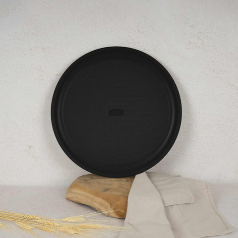 Product image of Pizza pan 32cm. Part of the Leonardo Collection . Features: • Material: carbon steel with titanPro non-stick coating • Size: 32*1,1 cm • Color: matt bordeaux. (Studio view). Official Berlinger Haus product, boosted by Promintra sl.