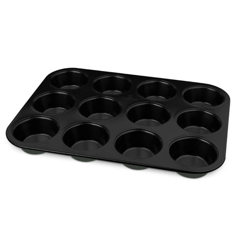 Product image of 12cups muffin pan. Part of the Matte Green Collection . Features: • Material: carbon steel with titanPro non-stick coating • Size: 35*26,5*3 cm • Color: matt green. (Studio view). Official Berlinger Haus product, boosted by Promintra sl.