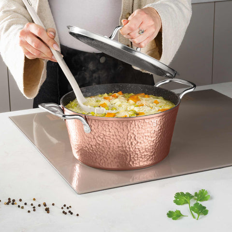 Product image of Casserole with lid 24cm. Part of the Hammered Copper Collection . Features: • Material: forged aluminum with non-stick marble coating • Casserole with lid Ø24*11,8 cm 4,1L • Color: copper REGISTERED DESIGN BY BERLINGER HAUS!. (Studio view). Official Berlinger Haus product, boosted by Promintra sl.