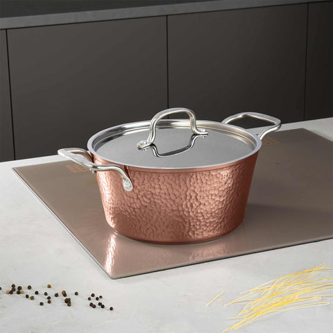 Product image of Casserole with lid 24cm. Part of the Hammered Copper Collection . Features: • Material: forged aluminum with non-stick marble coating • Casserole with lid Ø24*11,8 cm 4,1L • Color: copper REGISTERED DESIGN BY BERLINGER HAUS!. (Studio view). Official Berlinger Haus product, boosted by Promintra sl.