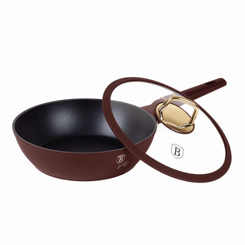 Product image of Deep frypan with lid 24cm. Part of the Leonardo Collection . Features: • Material: forged aluminum with non-stick titanPro coating • Deep frypan with lid Ø24*6,5 cm 2,3L • Color: matt bordeaux REGISTERED DESIGN BY BERL.... (Studio view). Official Berlinger Haus product, boosted by Promintra sl.