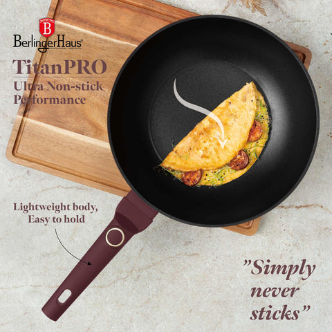 Product image of Wok 28cm. Part of the Leonardo Collection . Features: • Material: forged aluminum with non-stick titanPro coating • Wok Ø28*7,4 cm 3,2L • Color: matt bordeaux REGISTERED DESIGN BY BERLINGER HAUS!. (Studio view). Official Berlinger Haus product, boosted by Promintra sl.