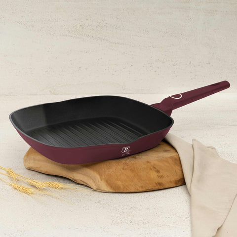Product image of Grill pan 28cm. Part of the Leonardo Collection . Features: • Material: forged aluminum with non-stick titanPro coating • Grill pan Ø28*4,1 cm 2,1L • Color: matt bordeaux REGISTERED DESIGN BY BERLINGER HAUS!. (Studio view). Official Berlinger Haus product, boosted by Promintra sl.