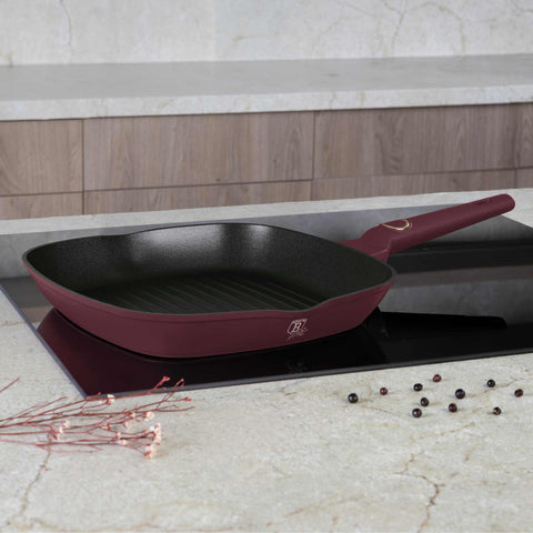 Product image of Grill pan 28cm. Part of the Leonardo Collection . Features: • Material: forged aluminum with non-stick titanPro coating • Grill pan Ø28*4,1 cm 2,1L • Color: matt bordeaux REGISTERED DESIGN BY BERLINGER HAUS!. (Studio view). Official Berlinger Haus product, boosted by Promintra sl.