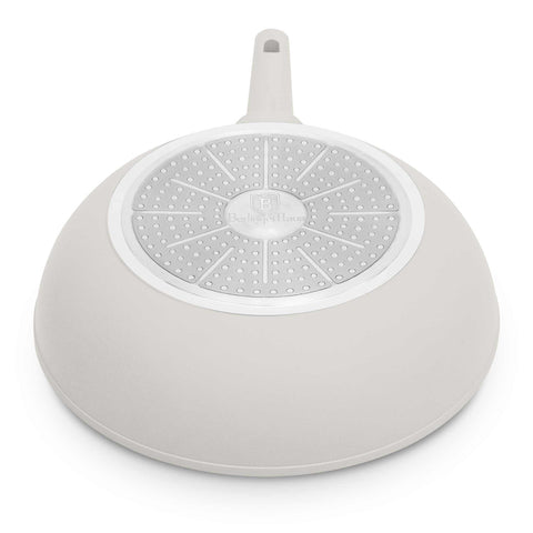 Product image of Wok 28cm. Part of the Sahara Collection . Features: • Material: forged aluminum with non-stick titanPro coating • Wok Ø28*7,4 cm 3,2L • Color: matt cream REGISTERED DESIGN BY BERLINGER HAUS!. (Studio view). Official Berlinger Haus product, boosted by Promintra sl.