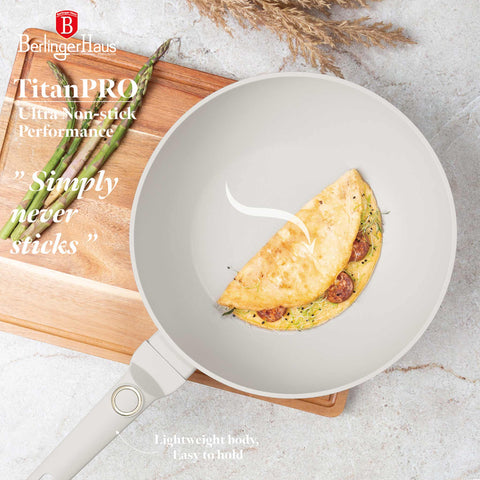 Product image of Wok 28cm. Part of the Sahara Collection . Features: • Material: forged aluminum with non-stick titanPro coating • Wok Ø28*7,4 cm 3,2L • Color: matt cream REGISTERED DESIGN BY BERLINGER HAUS!. (Studio view). Official Berlinger Haus product, boosted by Promintra sl.