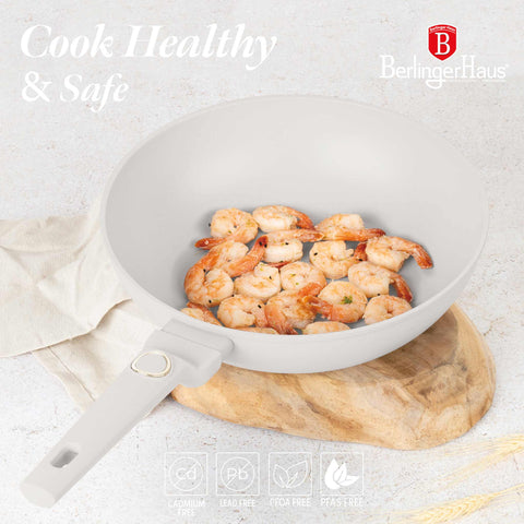 Product image of Wok 28cm. Part of the Sahara Collection . Features: • Material: forged aluminum with non-stick titanPro coating • Wok Ø28*7,4 cm 3,2L • Color: matt cream REGISTERED DESIGN BY BERLINGER HAUS!. (Studio view). Official Berlinger Haus product, boosted by Promintra sl.