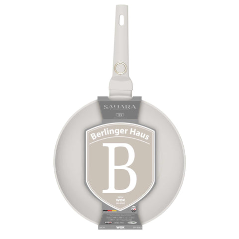 Product image of Wok 28cm. Part of the Sahara Collection . Features: • Material: forged aluminum with non-stick titanPro coating • Wok Ø28*7,4 cm 3,2L • Color: matt cream REGISTERED DESIGN BY BERLINGER HAUS!. (Studio view). Official Berlinger Haus product, boosted by Promintra sl.