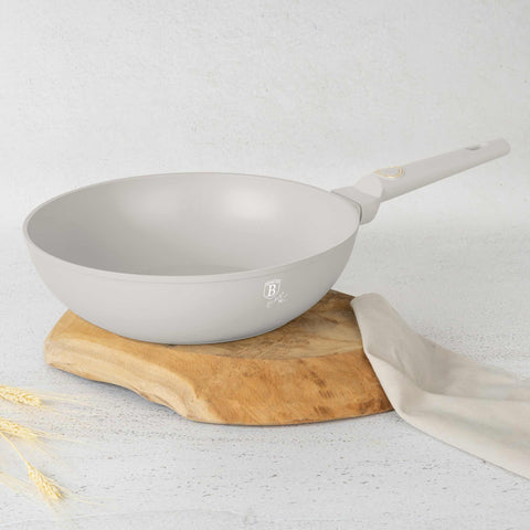 Product image of Wok 28cm. Part of the Sahara Collection . Features: • Material: forged aluminum with non-stick titanPro coating • Wok Ø28*7,4 cm 3,2L • Color: matt cream REGISTERED DESIGN BY BERLINGER HAUS!. (Studio view). Official Berlinger Haus product, boosted by Promintra sl.
