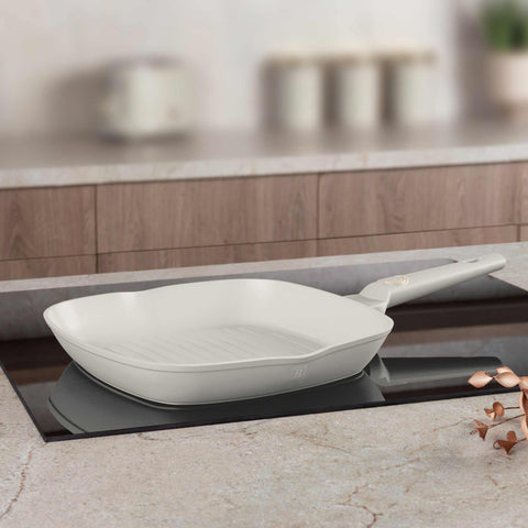 Product image of Grill pan 28cm. Part of the Sahara Collection . Features: • Material: forged aluminum with non-stick titanPro coating • Grill pan Ø28*4,1 cm 2,1L • Color: matt cream REGISTERED DESIGN BY BERLINGER HAUS!. (Studio view). Official Berlinger Haus product, boosted by Promintra sl.