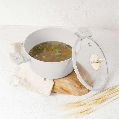 Product image of Casserole with lid 24cm. Part of the Sahara Collection . Features: • Material: forged aluminum with non-stick titanPro coating • Casserole with lid Ø24*11,8 cm 4,1L • Color: matt cream REGISTERED DESIGN BY BERLINGE.... (Studio view). Official Berlinger Haus product, boosted by Promintra sl.