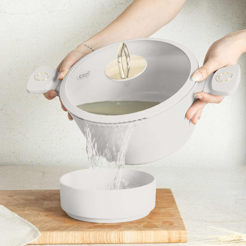 Product image of Casserole with lid 24cm. Part of the Sahara Collection . Features: • Material: forged aluminum with non-stick titanPro coating • Casserole with lid Ø24*11,8 cm 4,1L • Color: matt cream REGISTERED DESIGN BY BERLINGE.... (Studio view). Official Berlinger Haus product, boosted by Promintra sl.