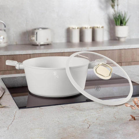 Product image of Casserole with lid 28cm. Part of the Sahara Collection . Features: • Material: forged aluminum with non-stick titanPro coating • Casserole with lid Ø28*12,4 cm 6,1L • Color: matt cream REGISTERED DESIGN BY BERLINGE.... (Studio view). Official Berlinger Haus product, boosted by Promintra sl.