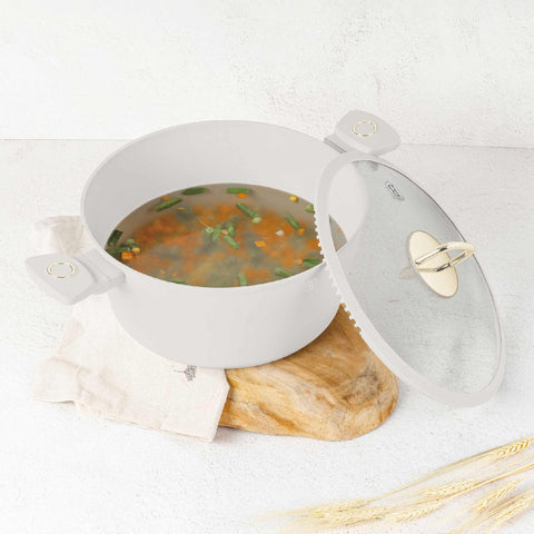 Product image of Casserole with lid 28cm. Part of the Sahara Collection . Features: • Material: forged aluminum with non-stick titanPro coating • Casserole with lid Ø28*12,4 cm 6,1L • Color: matt cream REGISTERED DESIGN BY BERLINGE.... (Studio view). Official Berlinger Haus product, boosted by Promintra sl.