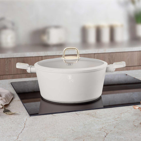 Product image of Casserole with lid 28cm. Part of the Sahara Collection . Features: • Material: forged aluminum with non-stick titanPro coating • Casserole with lid Ø28*12,4 cm 6,1L • Color: matt cream REGISTERED DESIGN BY BERLINGE.... (Studio view). Official Berlinger Haus product, boosted by Promintra sl.