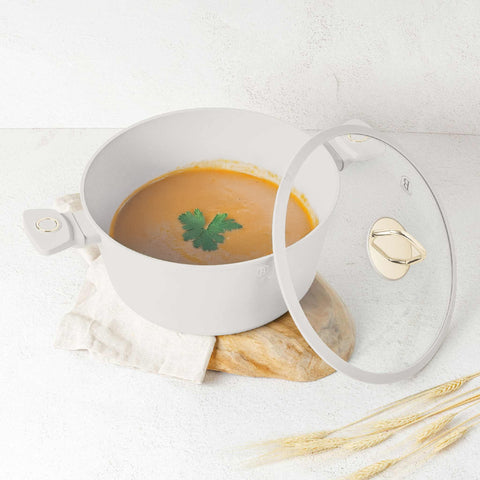 Product image of Casserole with lid 30cm. Part of the Sahara Collection . Features: • Material: forged aluminum with non-stick titanPro coating • Casserole with lid Ø30*13,5 cm 8L • Color: matt cream REGISTERED DESIGN BY BERLINGER .... (Studio view). Official Berlinger Haus product, boosted by Promintra sl.